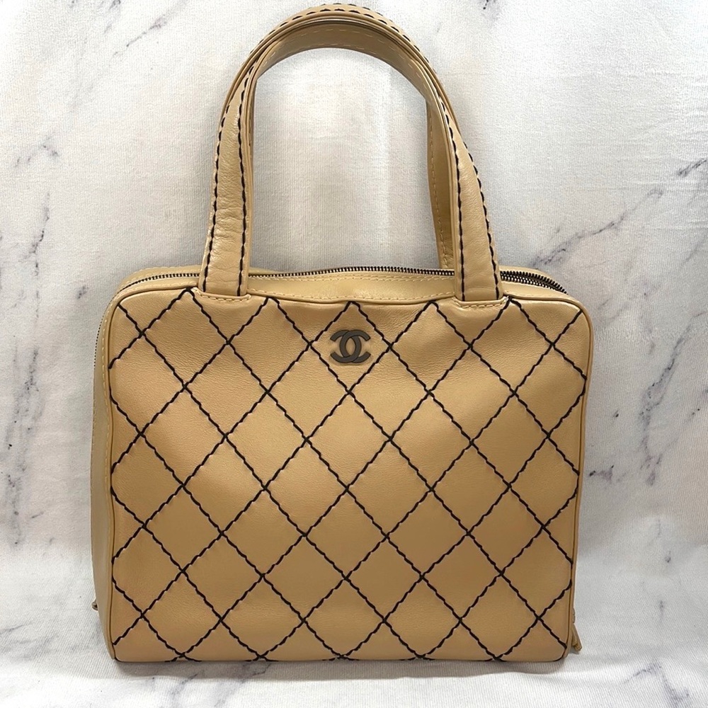 CHANEL Surpique Wild Stitch With Pouch